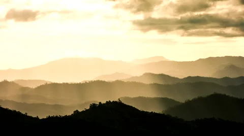 HD Time lapse hill gold sun beam tilt up Stock Footage 40091591