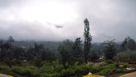 HD Time-lapse | Rainy day, hill station, Mountain, city, trees, sunshine, Clouds Stock Footage 116825173