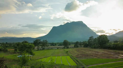 HD Time Lapse Sunset Mountain tilt up Stock Footage 39788216