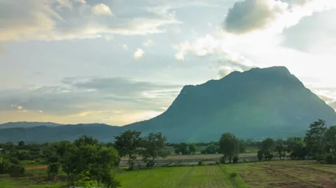 HD Time Lapse Sunset Mountain pan right Stock Footage 39789311