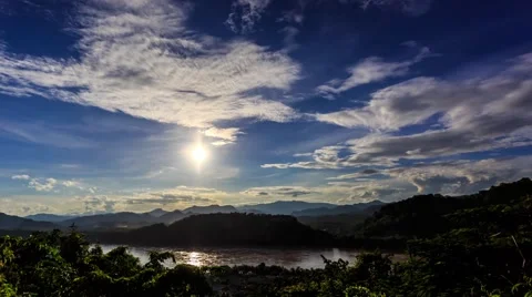 HD Time lapse. Sunset, moving clouds over the river Stock Footage 41250339