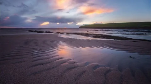 HD Time Lapse of the Sunset over a Beach in orkney Stock-Footage 256084068