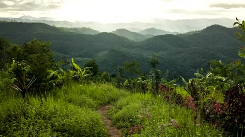 HD time lapse Wide Mountain view sun beam zoom out Stock Footage 40091144