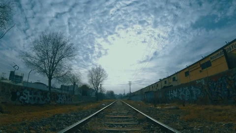 HD timelapse on cloudy day over train tracks. Stock Footage 169746527