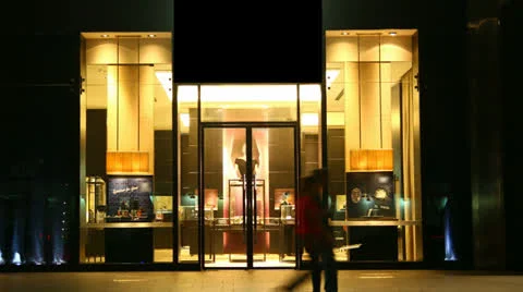 HD timelapse of People walking in front shopping Store Stock Footage 22558763