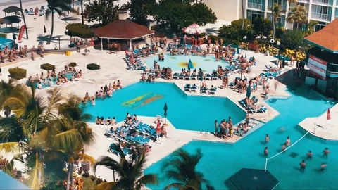 HD Timelapse - Poolside Party at Resort Stock Footage 128936394
