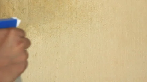 HD Timelapse of removing wallpaper from the wall 库存影片 914738