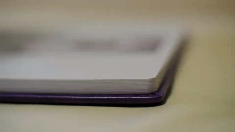 HD Top view of a opened paper notebook and the upper pages falles down 库存影片 96214975