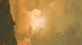 HD vertical close - Majestic thunderhead puffs and dies at sunset in red HD 동영상