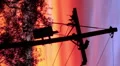 HD Vertical close Red skies at night - telephone pole silhouette Arizona sunset Video HD