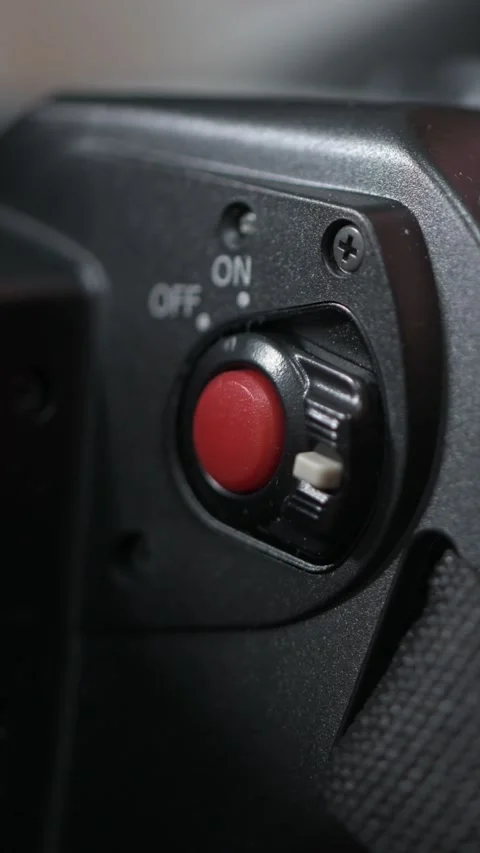 HD vertical macro footage of pressing red record button on camcorder Stock Footage 307343718