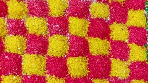 HD video of beautiful pattern or texture created with colorful rice for worship Stock Footage 170633887