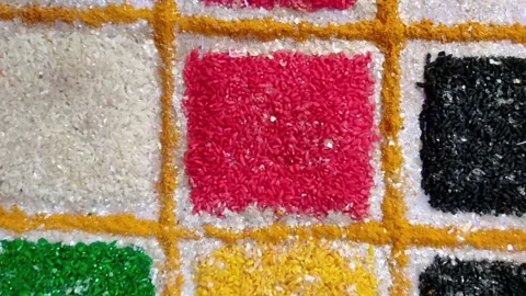 HD video of beautiful pattern or texture created with colorful rice for worship Stock Footage 170634024