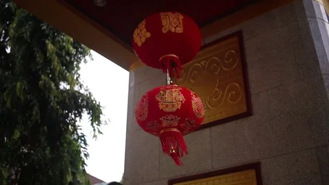 HD video Chinese red lanterns. Illuminate lamps to celebrate Chinese New Year. Stock Footage 83214733