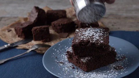 Hd video- stack of brownies decorated with powdered sugar 動画素材 106657528