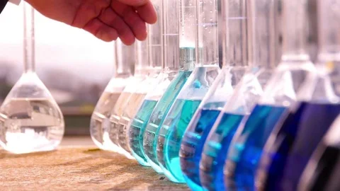 HD Volumetric flasks with colored liquid Stock Footage 82618371