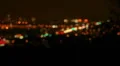 HD wide Night time traffic soft-focus desert brush silhouette foreground Video HD