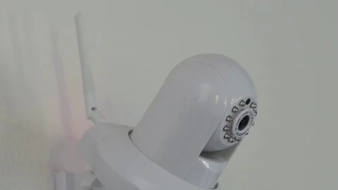 A hd wireless home security camera moving around. Stock Footage 79550527