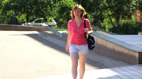 HD Young girl is walking. Slow motion Stock Footage