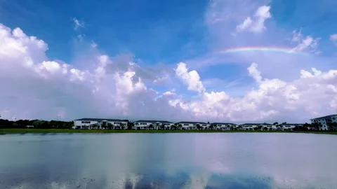 HD Zoom In Florida Lake Clouds Rainbow Stock Footage 267928361