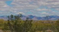 HD1080 30p zoom out Spring in Arizona high desert with puffy clouds in timelapse HD Footage