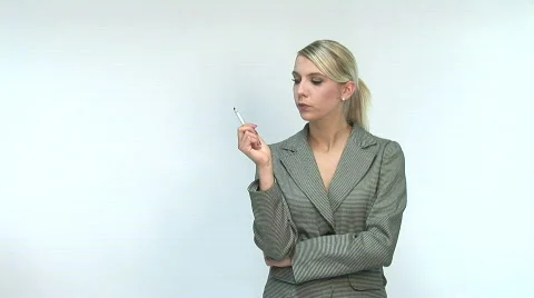 HD1080i Young blond business woman smoking a cigarette Stock Footage