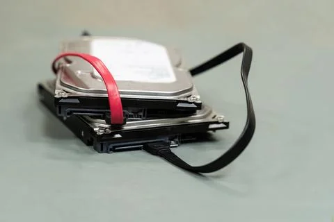 Hdd and sata cable close up data storage close up on light background Stock Photos