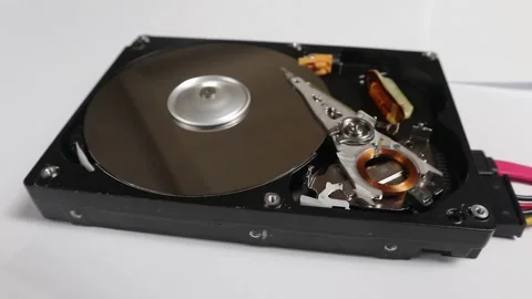 HDD, computer hard drive. he process of reading data on a computer hard disk Stock Footage 163257632
