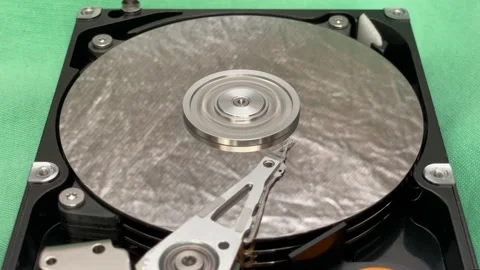 HDD data recovery concept disk spinning cyber security protection Stock Footage 235485013