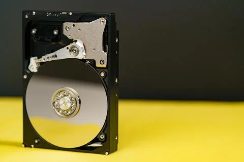Hdd disk on yellow black background Stock Photos