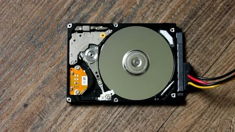 HDD - A Hard Disk Drive is open, broken and spin out Видео 112295750