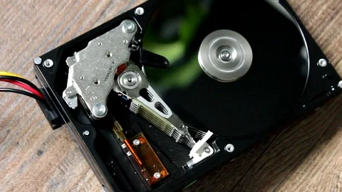 HDD - A Hard Disk Drive is open, broken and spin out Stock Footage 112295782