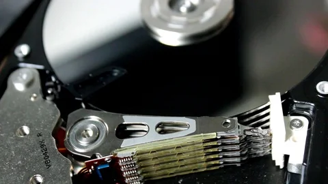 HDD - A Hard Disk Drive is open, broken and spin out Stock Footage 112296213