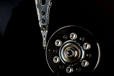 HDD Hard disk drive opened black platter Stock Photos