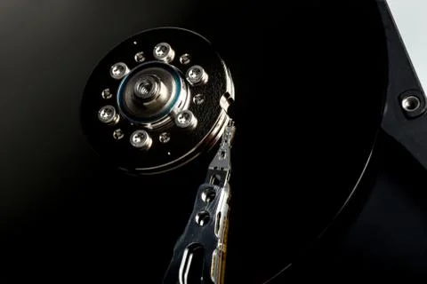 HDD Hard disk drive opened black platter Stock Photos