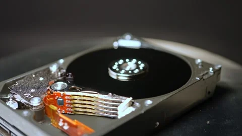 HDD, macro close up shot of hard drive rotation, shallow depth of field. Cy.. Video stock 271096530