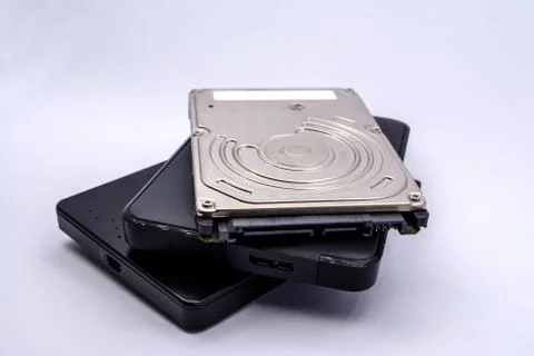 HDD - Stack of External and Internal Laptop Hard Disk Drives isolated on whit Stock Photos