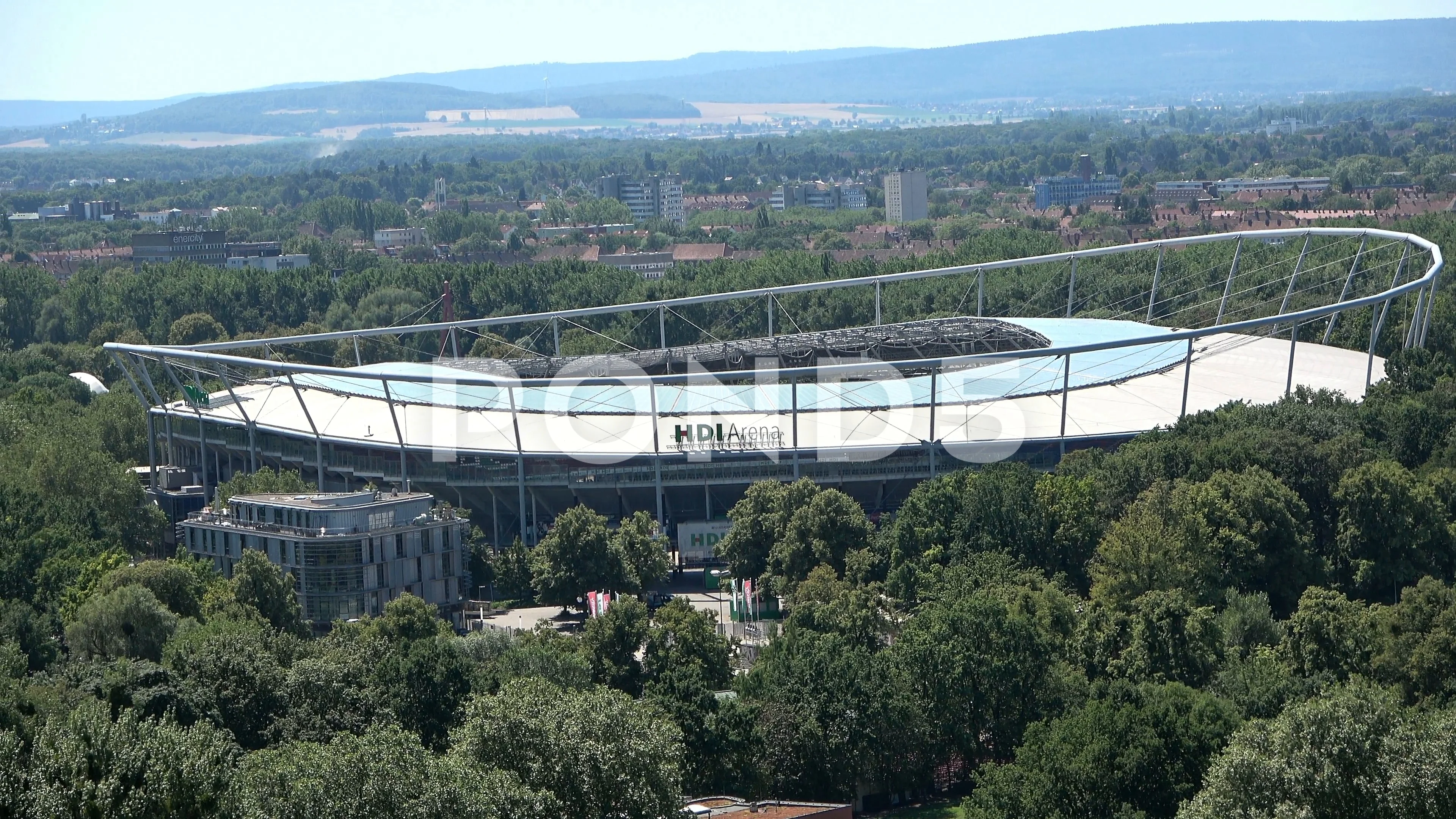 HDI-Arena over Maschpark to Maschsee | Stock Video | Pond5