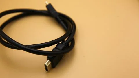 HDMI cabel for IT yellow background Stock Photos