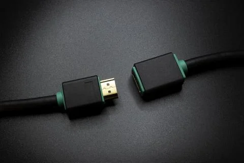 HDMI cable isolated on black background Stock Photos