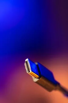 Hdmi connector with large copyspace area. Neon tech closeup. Stock Photos