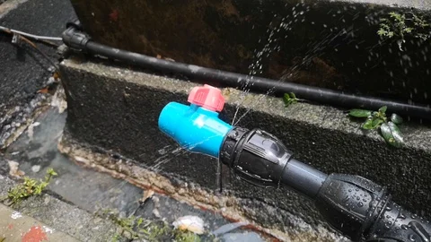 HDPE 1-inch black pipe leaked Stock Footage 97806341