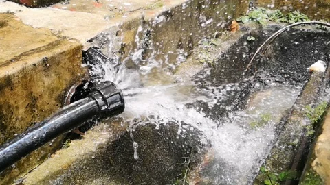 HDPE 1-inch black pipe leaked Stock Footage 97809681