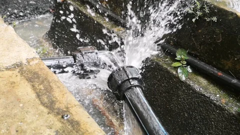 HDPE 1-inch black pipe leaked Stock Footage 97809716