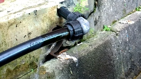 Hdpe black pipe leaking 2 Full HD Stock Footage 92187579