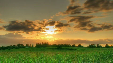 HDR time lapse of sunset over fields Stock Footage 234991