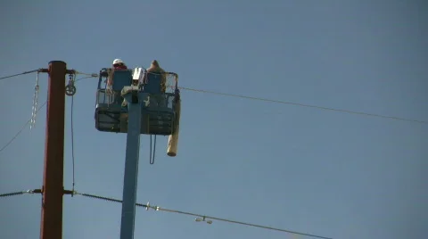 HDV: Men Working on Power Lines Stock Footage 105409