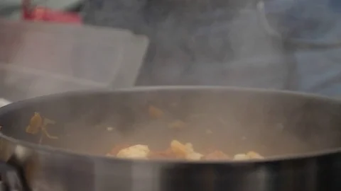 He chef prepares a black paste with seafood and whiskey at the festival of food Video stock 84263977