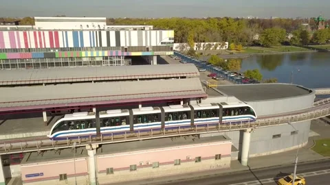 He flying camera is filming the monorail of VDNh and the Ostankino tower Vídeos de archivo 162693097