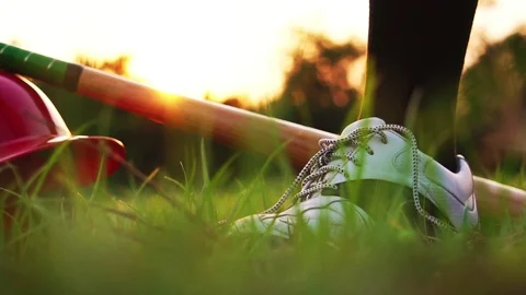 He glanced baseball before starting the competition in the field Stock Footage 106137675